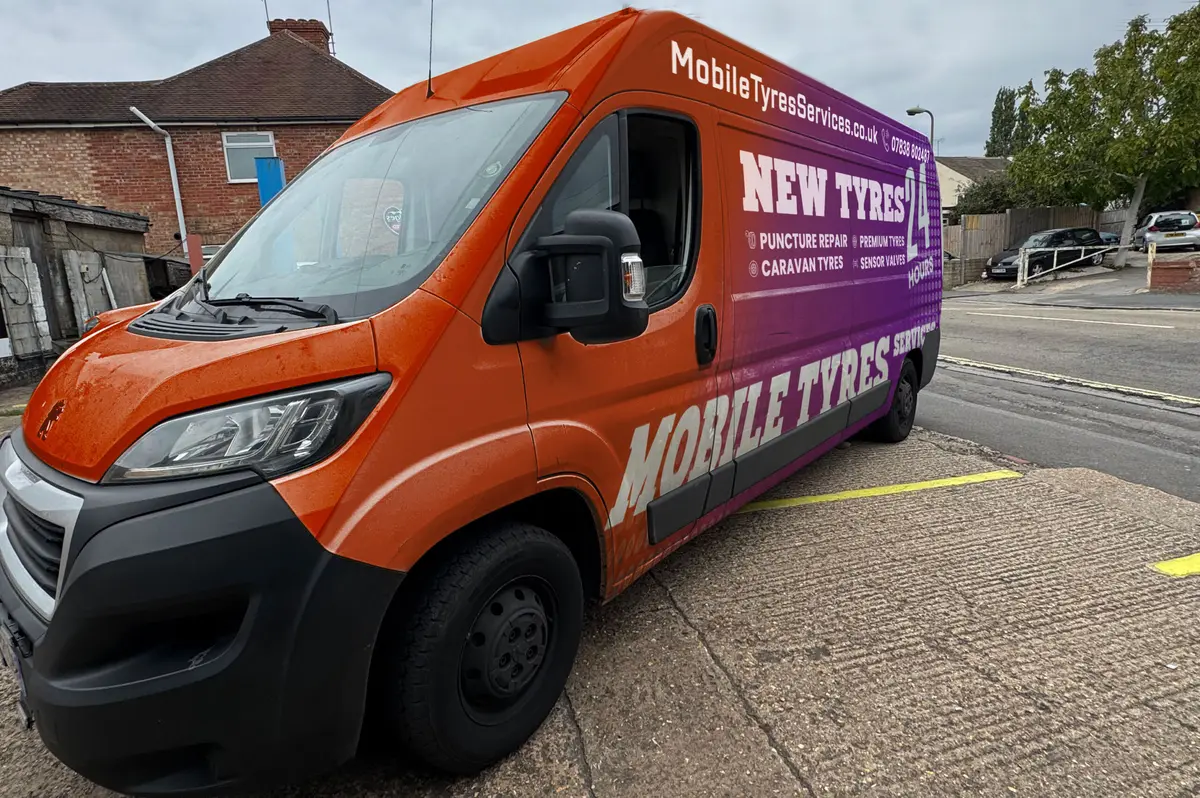 Mobile Tyres Services van in orange and purple livery, parked and ready for a call-out
